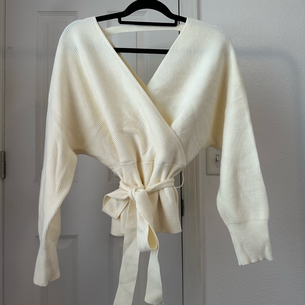 Cream ribbed v/neck sweater with waist tie
